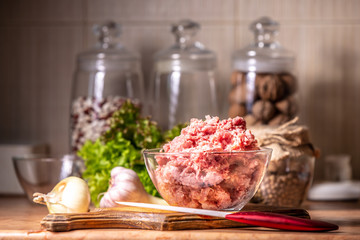 Minced pork in a glass bowl