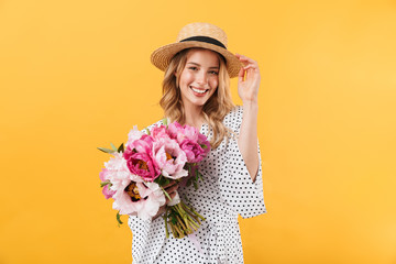 Beautiful young blonde woman wearing summer dress