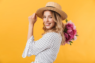 Beautiful young blonde woman wearing summer dress