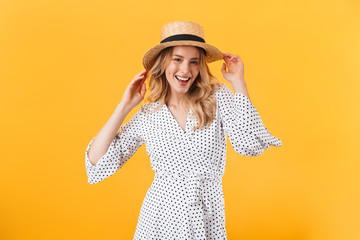 Beautiful young blonde woman wearing summer dress