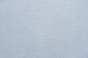 Light blue linen pastel fabric, background or texture, closeup, top view, horizontal