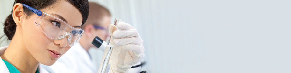 Chinese Female Woman Scientist Medical Research Lab or Laboratory Panorama Web Banner