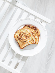 French toast on a light background.