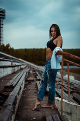 woman sitting dreaming and relaxing. Sunset. Summer. Outdoor