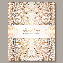 Wedding invitation card with gold shiny eastern and baroque rich foliage. Ornate islamic background for your design. Islam, Arabic, Indian, Dubai.