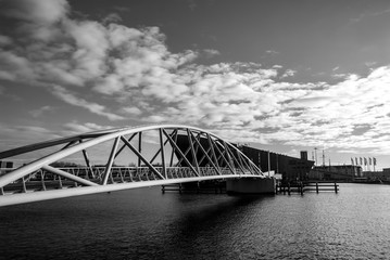 Pedestrian bridge over canal, Amsterdam, Netherlands