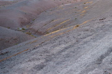 Detail of a road in the rocky desert of Morocco.