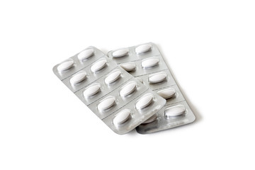 Two blister packs with tablets