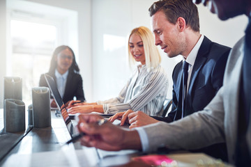 Diverse businesspeople having a meeting together in an office
