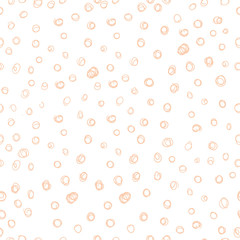 Hand drawn dots seamless pattern. Beautiful sketch dots with soft peach background. Elegant fabric on light background Surface pattern design