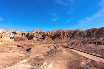 Rainbow Basin landscape panorama with colorful sandstone formations. California, USA.