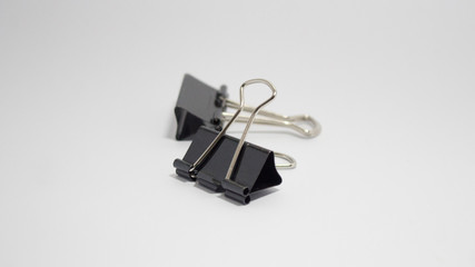 white background black paperclip object