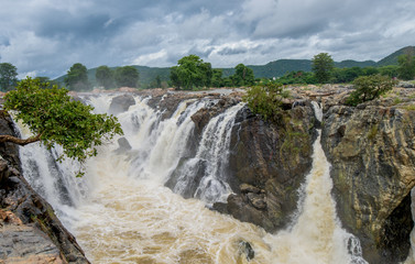 Hogenakkal Falls - Waterfall is in South India on the Kaveri river in the Dharmapuri district of the Indian state of Tamil Nadu. It is located 180 km from Bangalore and 46 km from Dharmapuri.