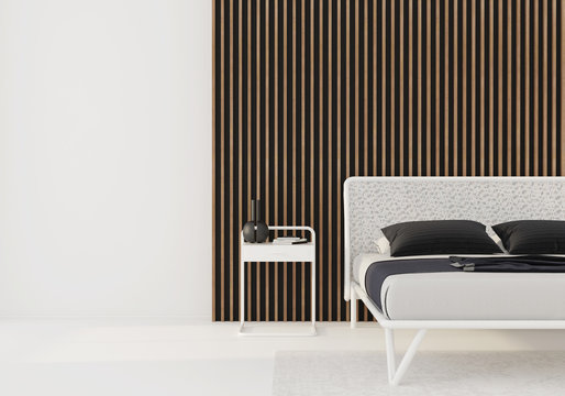 White bedroom with wooden slats on the wall