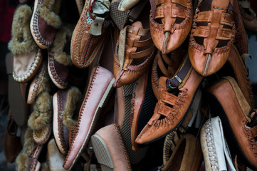 Opanak (traditional macedonina shoes) at Old Bazaar in Skopje, Macedonia, Balkans, Europe - obrazy, fototapety, plakaty