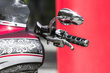 Heavy powerful motorcycle. Details chrome cruiser close-up. Biker background. Two-wheeled vehicle....