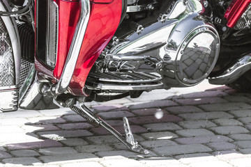Heavy powerful motorcycle. Details chrome cruiser close-up. Biker background. Two-wheeled vehicle....