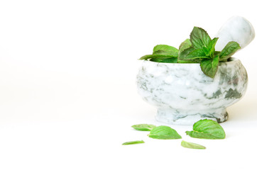 Fresh mint leafs in marble mortar bowl. - Image