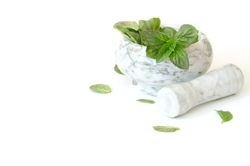 Fresh mint leafs in marble mortar bowl. - Image