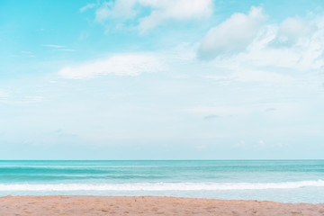 Tropical nature clean beach and white sand in summer with sun light blue sky and bokeh background.