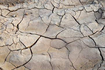 A dry lake or swamp in the process of drought and lack of rain or moisture, a global natural disaster. The cracked soil of the earth due to climate change. Hydrological drought  - Image