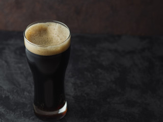 The dark glass of the craft beer porter
