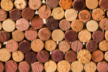 Close-up of used wine corks forming a pattern creating an original background