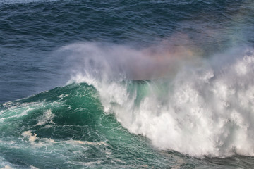 waves crashing on rocks
