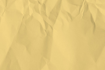 Paper beige color is crumpled and aged. The texture of the surface is old and wrinkled in vintage...