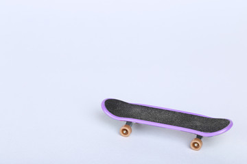 Fingerboard on grey background