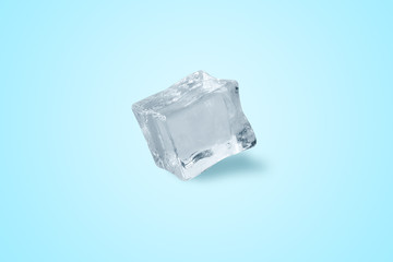 ice cube over blue light background