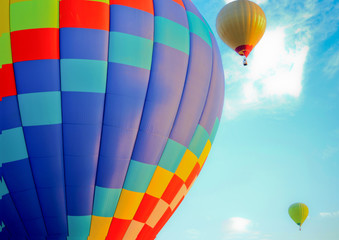 colorful hot air balloons on the blue summer sky background