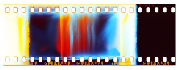 Film strip template, empty color 135 type (35mm) film with scratches, cracks, dust and light leaks isolated on white background with work path. - obrazy, fototapety, plakaty