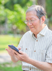 Older man use cellphone