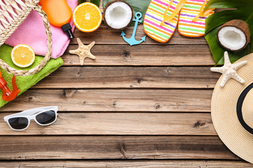 Fashion clothing with starfishes and fruits on brown wooden table