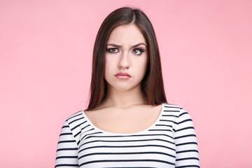 Fototapeta premium Beautiful young woman on pink background