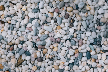 beauty in nature creative with multicolor pebbles pattern background. 