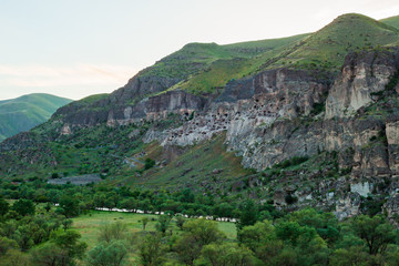 Fototapeta na wymiar View of Vardzia caves. Vardzia is a cave monastery site in southern Georgia, excavated from the slopes of the Erusheti Mountain on the left bank of the Kura River.