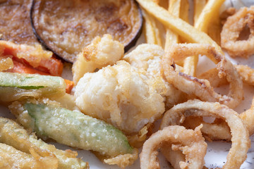 Close up of mix vegetables and calamari fried.