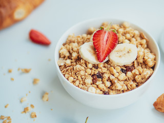 Close up English breakfast, oatmeal porridge and fruits in a bowl - healthy food