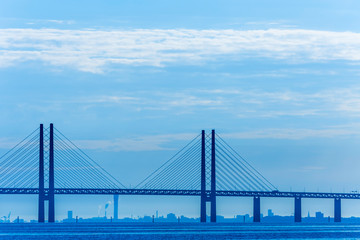 Fototapeta na wymiar Silhouette of Oresund bridge over the Baltic sea