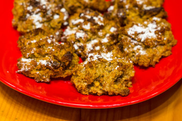 homemade oatmeal cookies with coconut, dates and powdered sugar