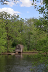 Small boat pier on Sudbury river in Minute Man National Historical Park near Concord, Massachusetts