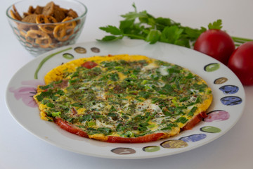 Italian frittata with herbs and tomatoes