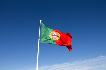 Portugal flag. The national Portuguese flag  waving on a pole. 