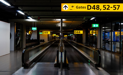Gates in Schiphol airport Amsterdam at night
