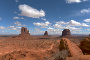 Fototapeta na wymiar Monument Valley National Park in Arizona with blue sky and clouds