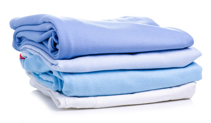 Stack blue folded clothing on white background isolation