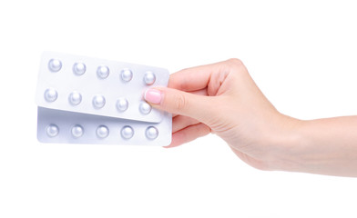 Blister of pills medicine pharmacy in hand on white background isolation