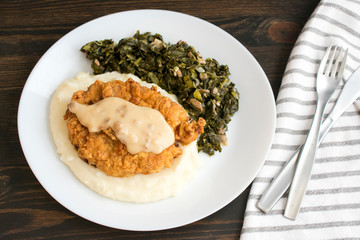 Chicken Fried Steak and Gravy with Mashed Potatoes and Collard Greens